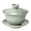 Gaiwan vert avec motif de paysage montagneux