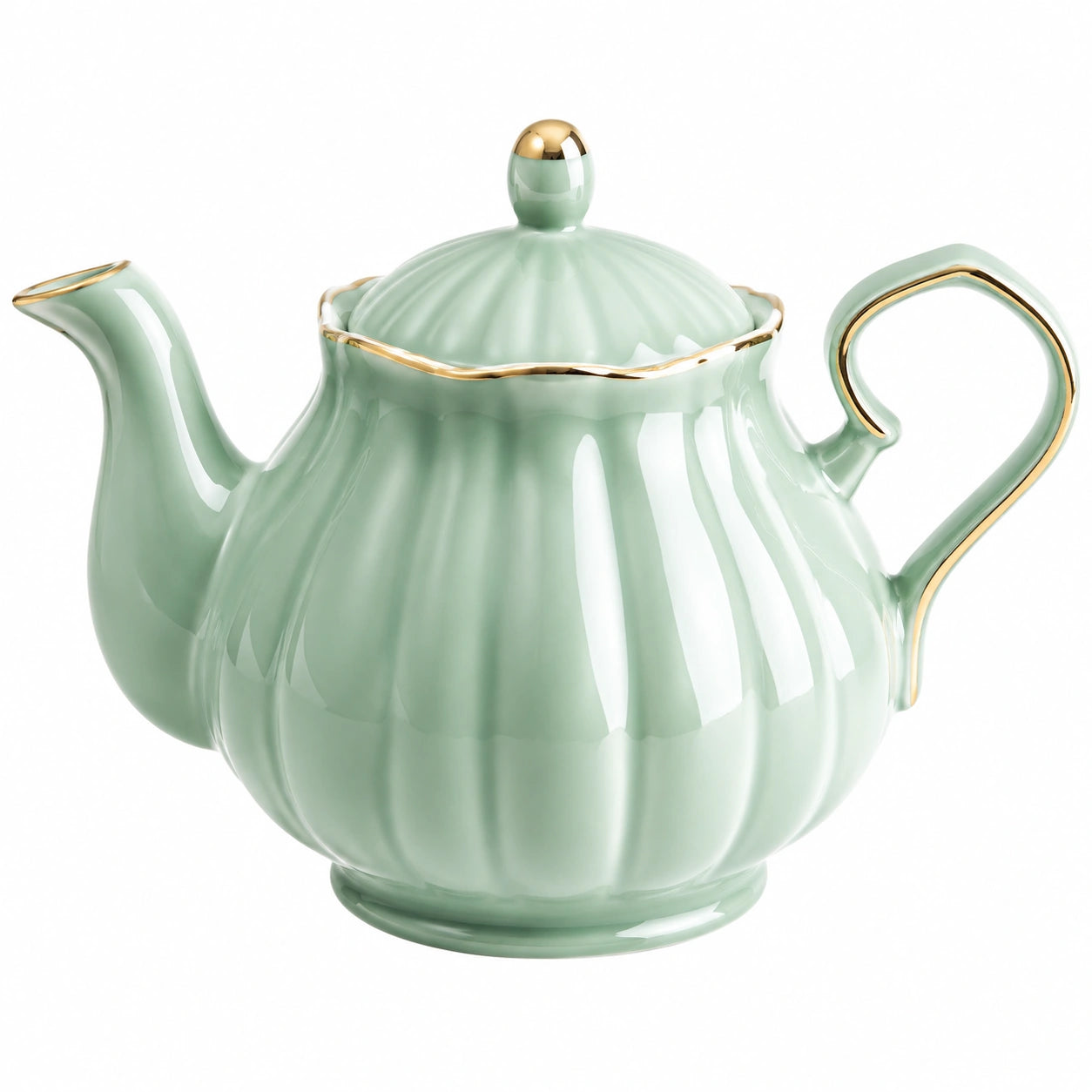 Théière en céramique verte avec motifs floraux et détails dorés